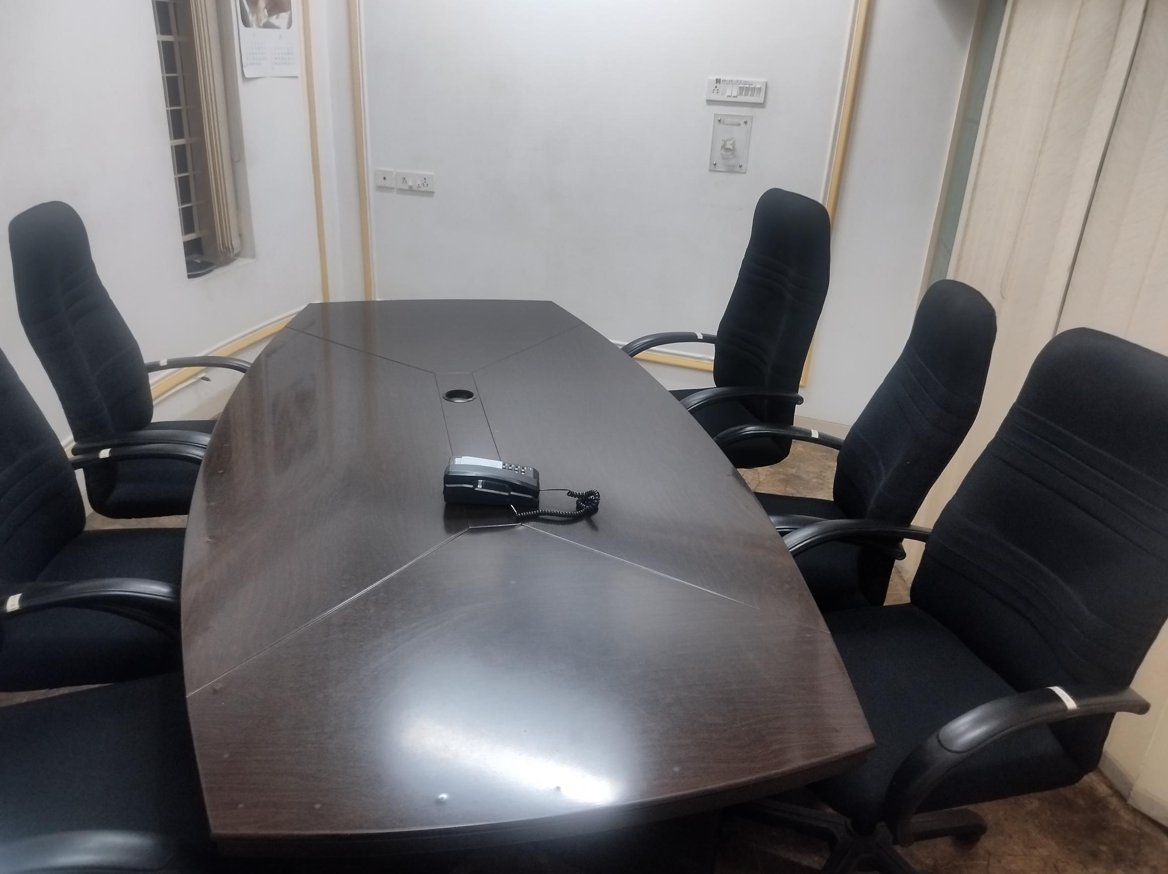 Professional conference room seating coworking Goregaon East near Aarey Metro